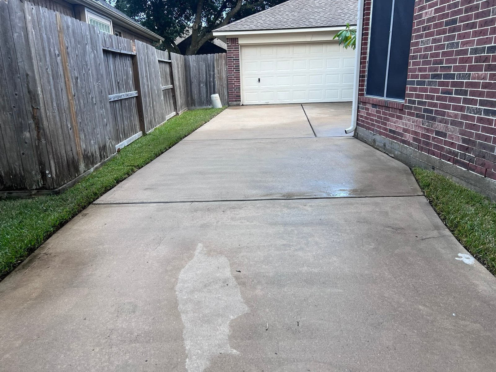 Freshly pressure washed driveway